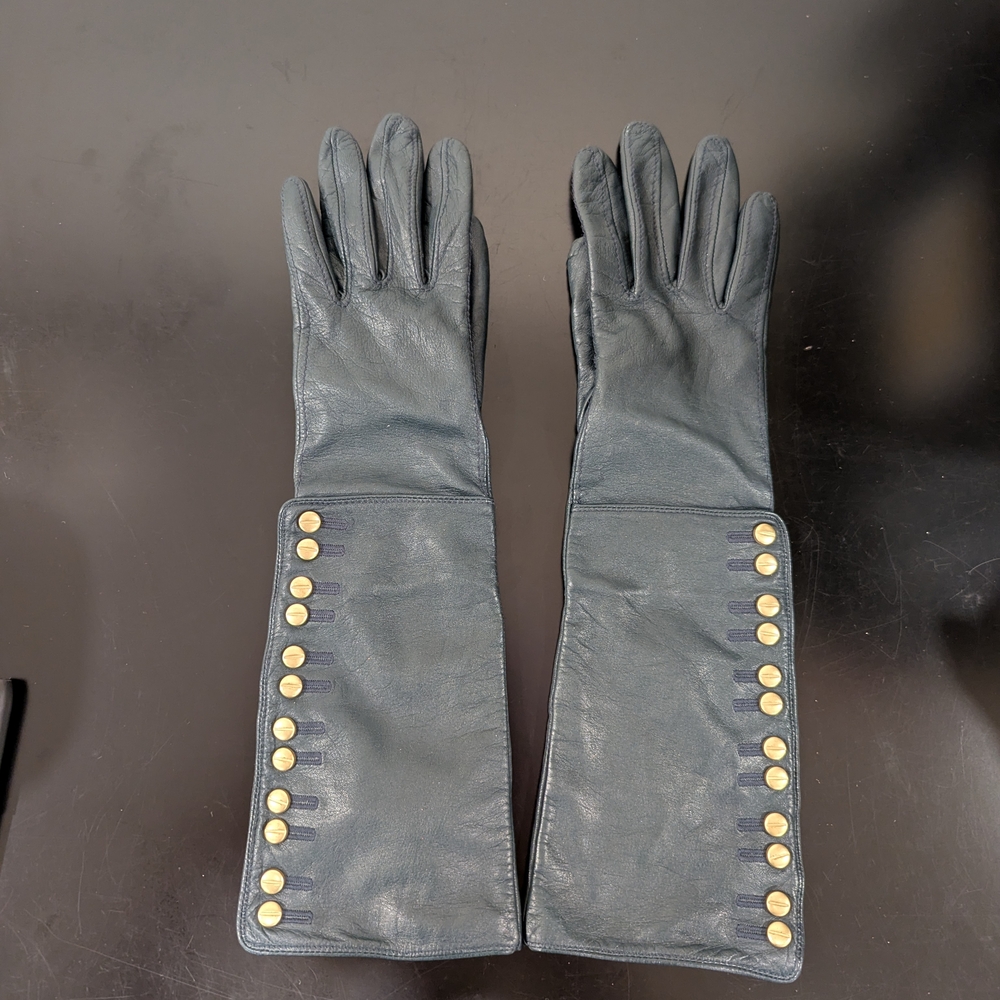 Elegant Black Leather Gloves with Gold Accents